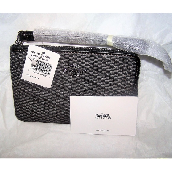 COACH Handbags - NWT COACH CORNER ZIP WRISTLET IN LEGACY JACQUARD
